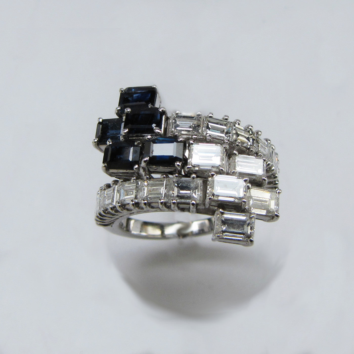 new deco ring, natural diamonds, natural sapphires, 18 K white gold, weight 6,8 g. (0.24 oz), width 16 mm max